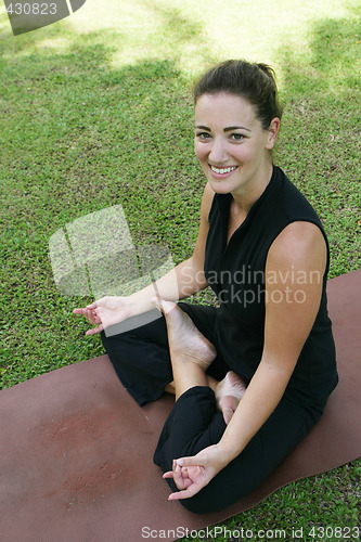 Image of Yoga in the park.