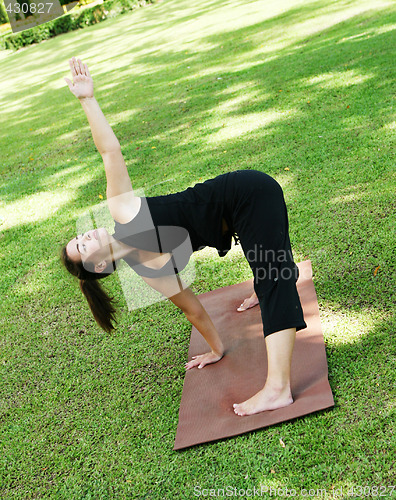 Image of Yoga in the park.