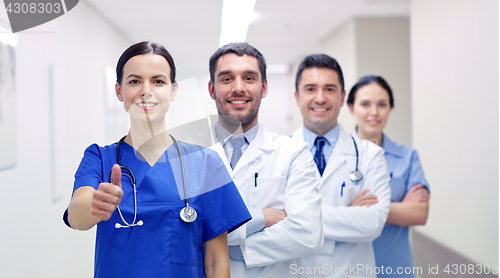 Image of medics or doctors at hospital showing thumbs up