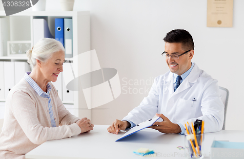 Image of senior woman and doctor meeting at hospital