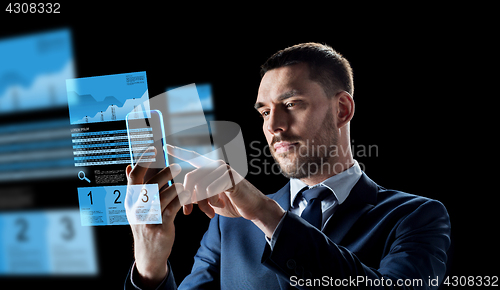 Image of businessman with smartphone and exchange charts