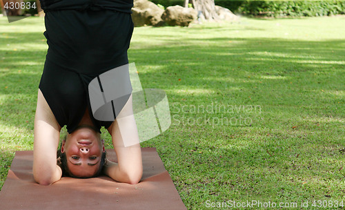 Image of Yoga in the park.