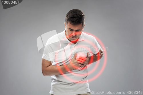 Image of unhappy man suffering from heart ache