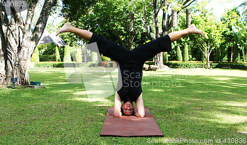 Image of Yoga in the park.