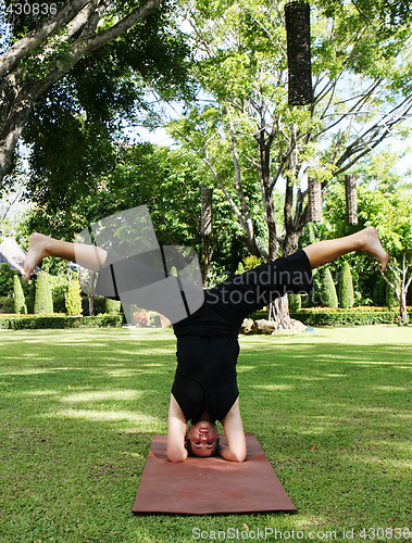 Image of Yoga in the park.