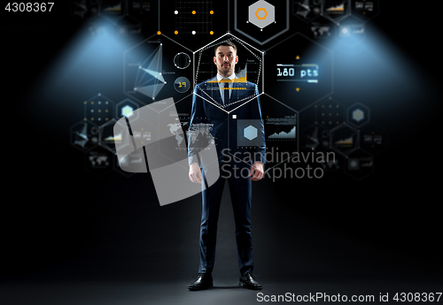 Image of businessman in suit over virtual screen