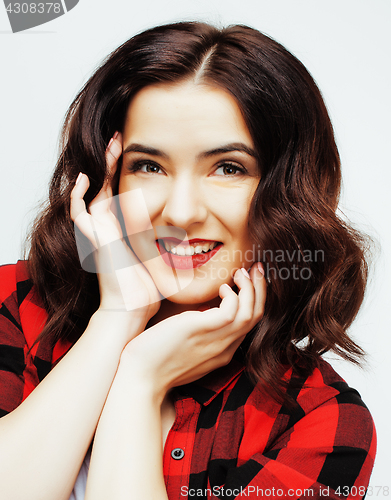 Image of young pretty stylish brunette hipster girl posing emotional isolated on white background happy smiling cool smile, lifestyle people concept 