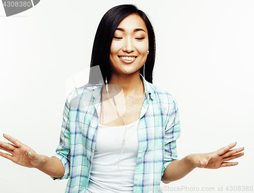 Image of young pretty asian woman posing cheerful emotional isolated on white background, lifestyle people concept 