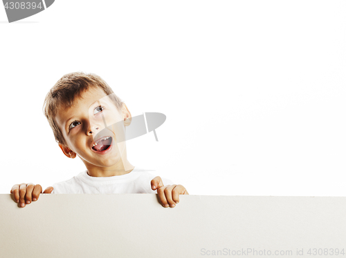 Image of little cute boy holding empty shit to copyspace isolated close u