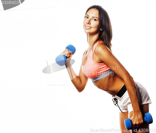 Image of young pretty slim woman with dumbbell isolated