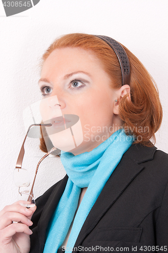 Image of Portrait of a redheaded woman business