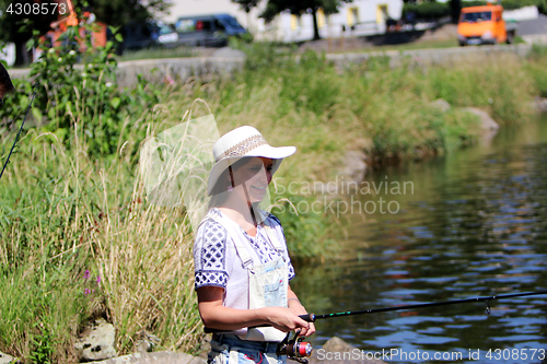 Image of Woman with freckles and hot pants