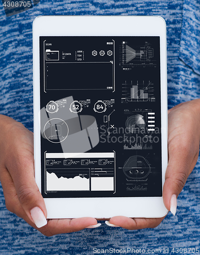 Image of Happy African American Woman Using Digital Tablet