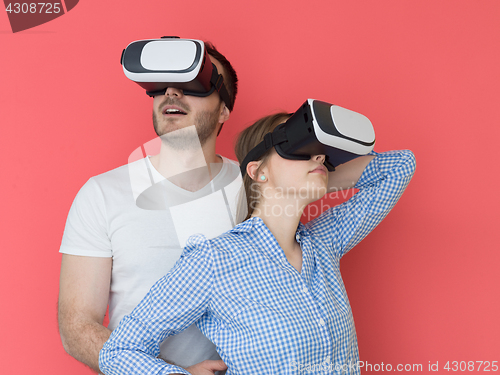 Image of happy couple using VR-headset glasses of virtual reality