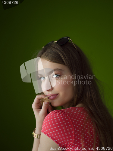 Image of woman over green background