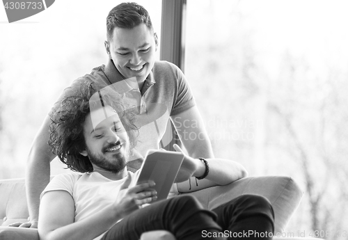 Image of Two friends taking selfie