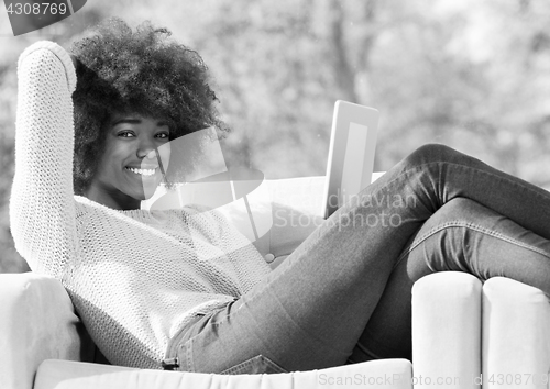 Image of Beautifl black girl lying on couch