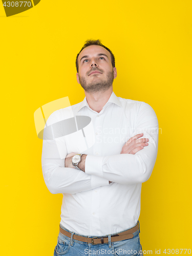 Image of man isolated over a yellow background