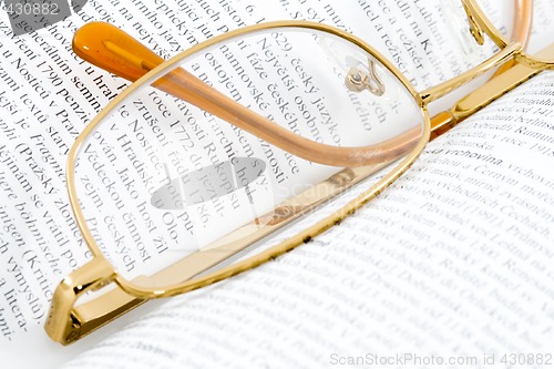 Image of Glasses on Books