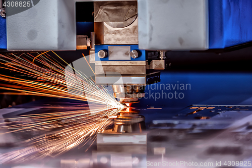 Image of CNC Laser cutting of metal, modern industrial technology.