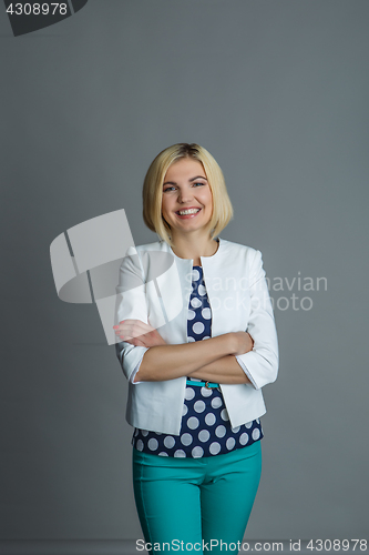 Image of Young model with arms crossed