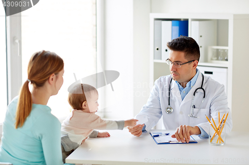 Image of woman with baby and doctor at clinic