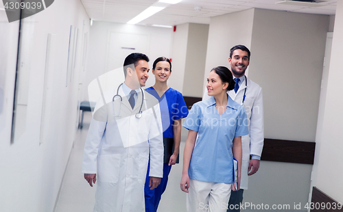 Image of group of happy medics or doctors at hospital