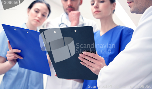 Image of close up of doctors with clipboard at hospital