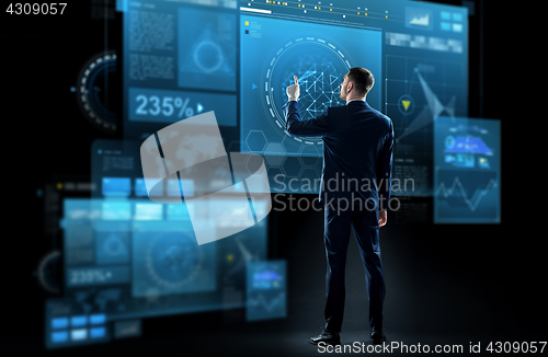 Image of businessman in suit touching virtual screen