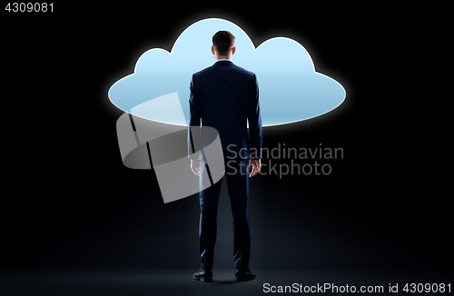 Image of businessman looking at virtual cloud hologram