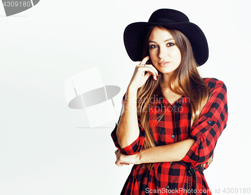 Image of young pretty brunette girl hipster in hat on white background casual close up dreaming smiling