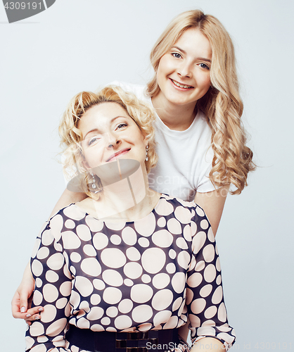 Image of mother with daughter together posing happy smiling isolated on white background with copyspace, lifestyle people concept 