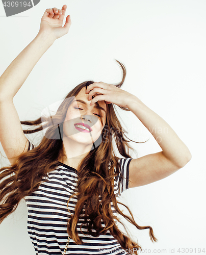 Image of young pretty stylish brunette hipster girl posing emotional isolated on white background happy smiling cool smile, lifestyle people concept 