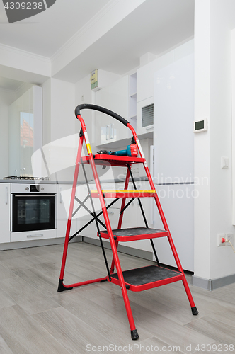 Image of Unfinished modern white kitchen