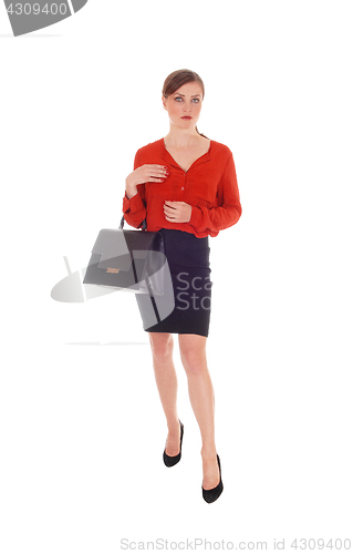 Image of Business woman with black purse.