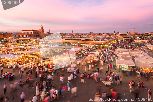 Image of Jamaa el Fna market square in sunset, Marrakesh, Morocco, north Africa.