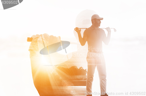 Image of Double exposure of senior golf player