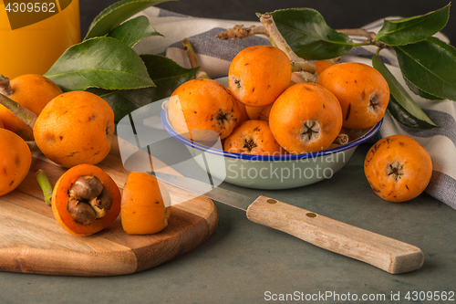 Image of loquats on kitchen counter