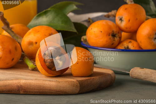 Image of loquats on kitchen counter