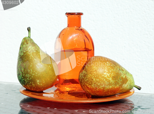 Image of Two pears and bottle with cider