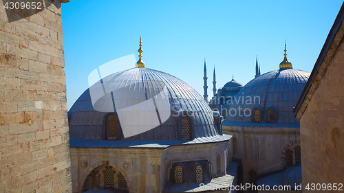 Image of Blue mosque with Domes of the Hagia Sophia in the foreground, Istanbul, Turkey