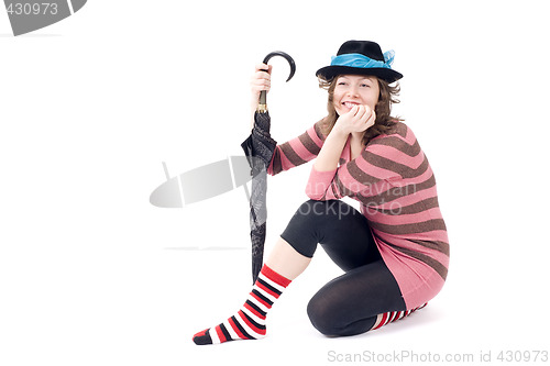 Image of Colorful dressed female with umbrella VI