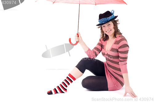 Image of Colorful dressed female with umbrella VII