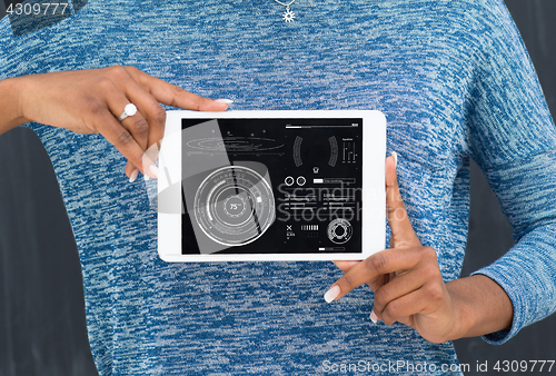 Image of Happy African American Woman Using Digital Tablet