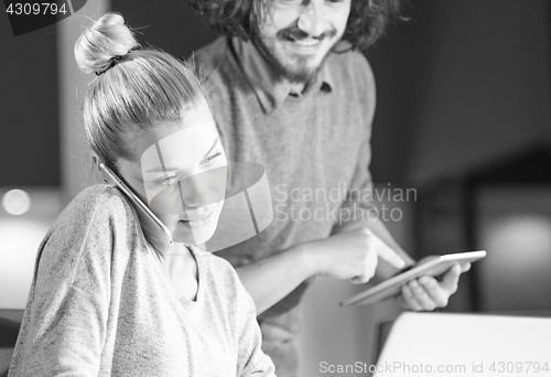 Image of Businesswoman talking on mobile phone