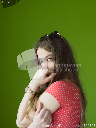 Image of woman over green background