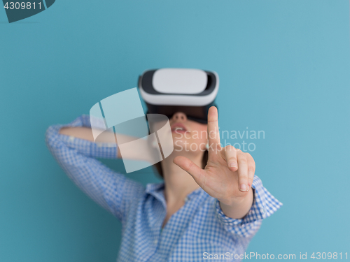 Image of woman using VR headset glasses of virtual reality