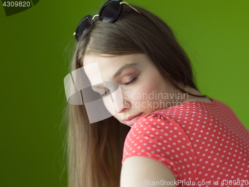 Image of woman over green background