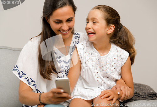 Image of Mother and Daughter at home