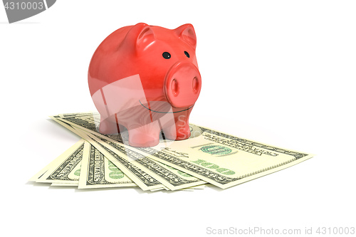 Image of a red piggy bank over dollar notes